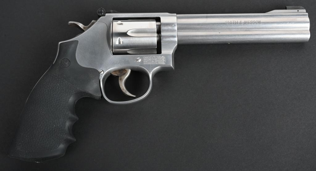 SMITH & WESSON 617 .22 LR STAINLESS REVOLVER: SERIAL NUMBER DAY1153, BARREL 6",CALIBER.22LR, MANUFACTURED 2007. Stainless steel 6 shot revolver with full lugged 6 inch barrel factory equipped with blade front sight and adjustable rear sight, smoo