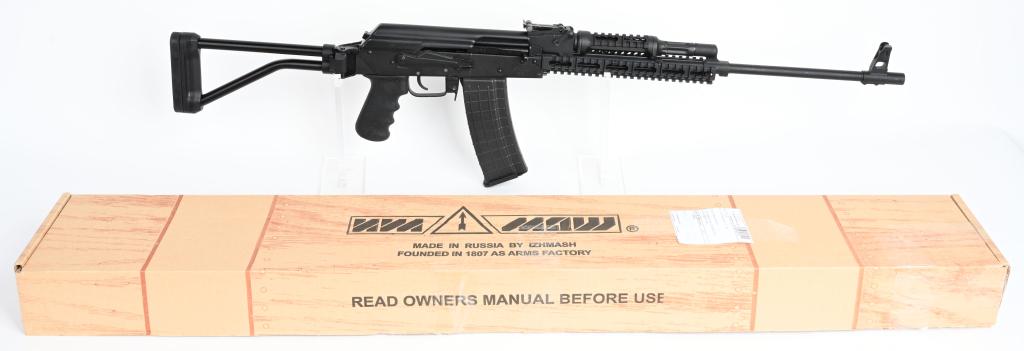 BOXED IZHMASH SAIGA M SEMI AUTO .223 SEMI AUTO AK: SERIAL: HO8160373 BARREL: 20.5" CALIBER: .223 REM Imported by Russian American Armory Company, this Izhmash built Saiga -M Self-loading hunting carbine features picatinny rails, a Hogue grip, side rai