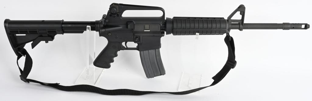 BUSHMASTER XM15-E2S 5.56 .223 SEMI-AUTO RIFLE: SERIAL: L105224 BARREL: 16" CALIBER: 5.56 NATO / .223 Bushmaster early BFI Windham marked XM15-E2S carbine rifle. Ban era production with no bayonet lug. Features fixed carry handle, USGI style hand g