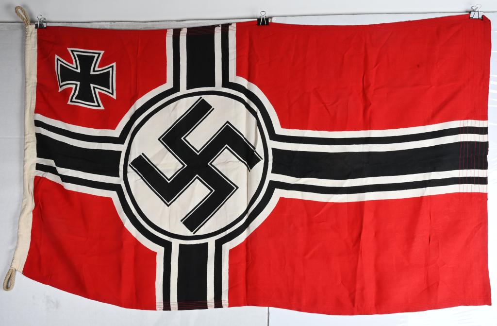 WWII NAZI GERMAN KRIEGSMARINE BATTLE FLAG 80X135: Second pattern (Circa 1937/38-1945) single piece dual sided printed cotton/linen construction national war flag. The flag features a red base field with a central white/black/white/black bordered whit