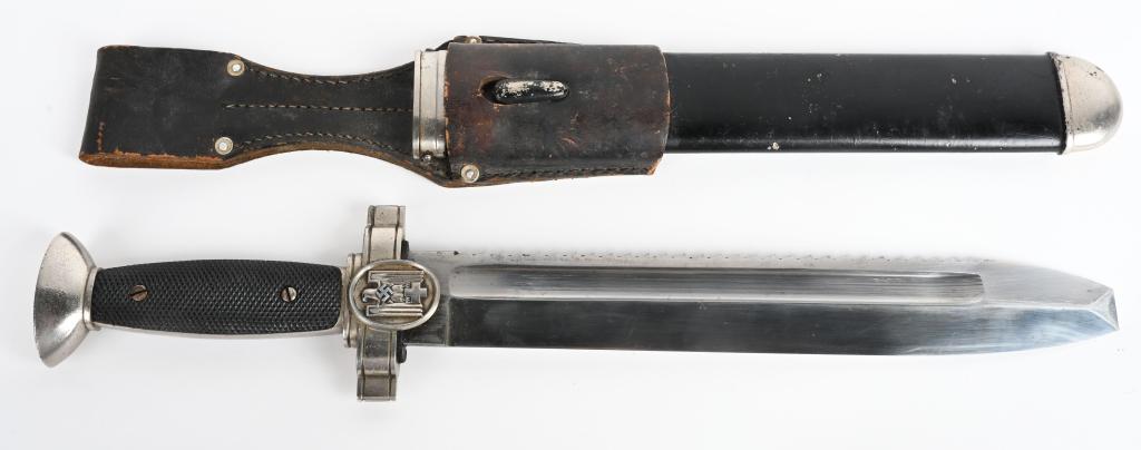 WWII NAZI GERMAN RED CROSS HEWER EM DAGGER WW2: Model 1938 Deutsches Rotes Kreuz (German Red Cross) Hewer. The blade is untouched and in excellent condition. The sharp teeth to the saw back are in perfect condition. The blade is stamped Ges Geschut