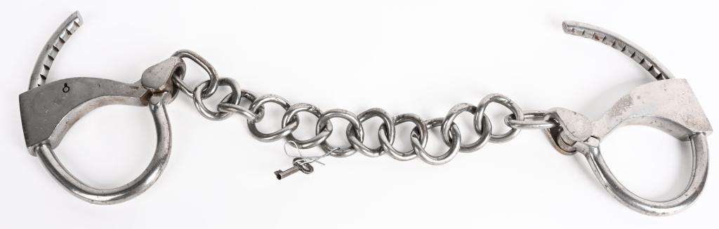 EARLY ATTICA PRISON TOWER DOUBLE LOCK HANDCUFFS: Each handcuff is approximately 4 3/4" LONG AND 3" W. Tower Double Lock Handcuff" Despite the round bow the Tower bottom key and single lock models could be shimmed by a determined prisoner with a prop