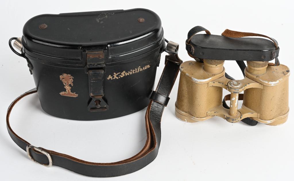WWII NAZI GERMAN AFRIKAKORPS USED BINOCULARS WW2: Tooled alloy and aluminum construction 6 x 30 power binoculars with black Bakelite and simulated leather fittings. The lens bodies retains most of it's tan finish. The binoculars have molded, brown Ba