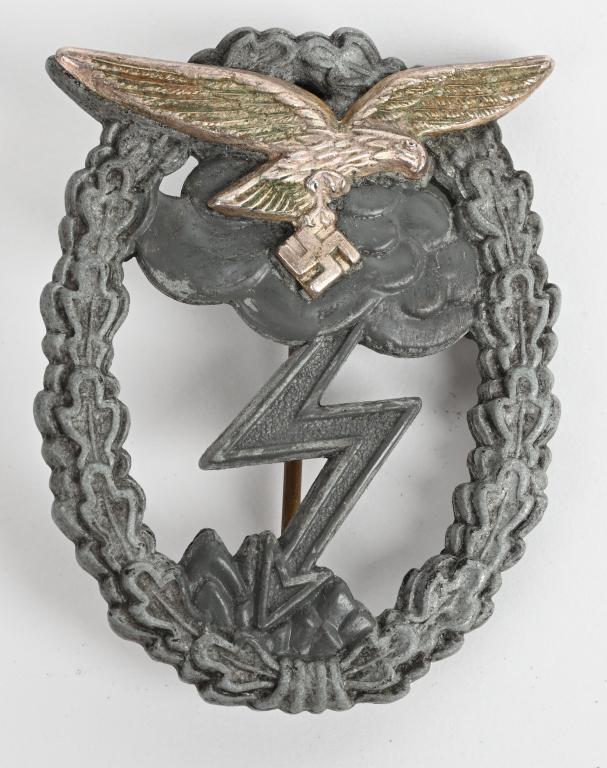 WWII NAZI GERMAN LUFTWAFFE GROUND COMBAT BADGE WW2: Nice quality, two piece, solid backed, die struck alloy construction , badge with bright silver and burnished grey finishes, is in the form of a silver washed, vertically oval, oak-leaf wreath with a 