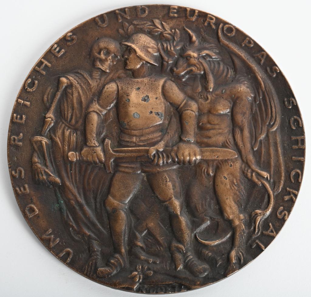WWII NAZI GERMAN BRONZE INVASION MEDAL BY GOETZ: Large bronze medal of Karl Xaver Goetz measuring 4 3/8 inches wide and is artist signed at the bottom of the medal. The invasion of 1944 is depicted on medal K-613 with the apocalyptic riders on plane