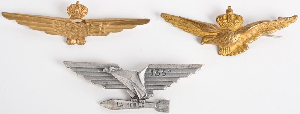 WWII ITALIAN PILOT & BOMBER WINGS LOT OF 3 WW2: WWII Italian pilot wings to include 1) ITALIAN WWII PILOTS WINGS. Original era manufacture. Clean, full size set of wings with the royal crown of Savoy at top, and clutched in the eagles talons, the f
