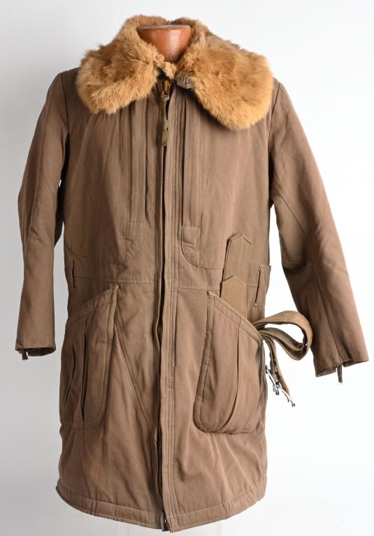 WWII JAPANESE ARMY WINTER FLIGHT SUIT PARKA WW2: WWII Japanese Flight Suit Parka. The jacket is brown canvas one piece with zippered slash pockets, zippered cuffs at ankles and arms, a snap pocket on the backside, open pockets on the thighs, zippere