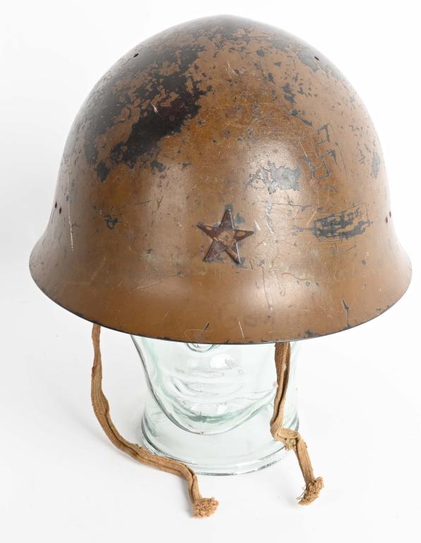 WWII JAPANESE IJA TYPE 90 COMBAT HELMET WW2: The standard WWII Japanese infantry combat helmet. The shell, constructed from chrome polybend steel retains a good portion of its original paint. The original IJA metal star affixed to the front. The