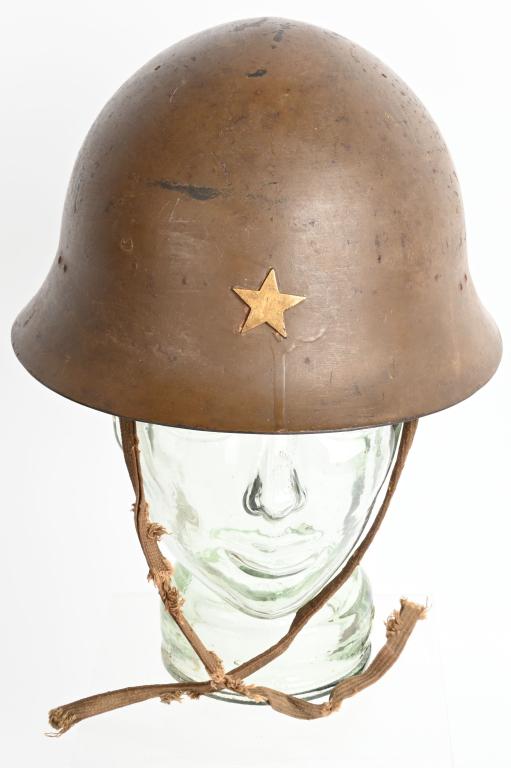 WWII IJA TYPE 90 COMBAT HELMET WITH LINER WW2: The standard WWII Japanese infantry combat helmet. The shell, constructed from chrome polybend steel retains a good portion of its original paint. The original IJA metal star affixed to the front but 