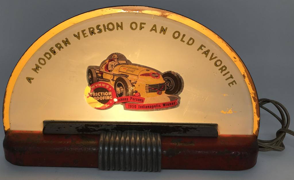 WYNN'S INDY 500 WINNER LIGHTUP ADVERTISING SIGN: Scarce Wynn's Friction Proofing 1950 Indianapolis 500 winner Johnny Parsons light up counter sign. Great deco style. All original and worked when tested. Shows some wear. 13"x8" Very Good
