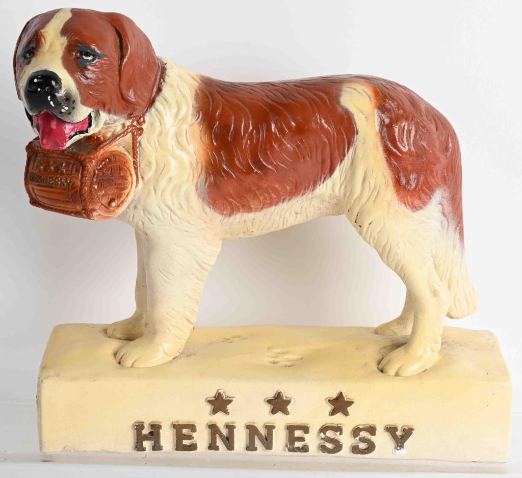HENNESSY COGNAC ST BERNARD ADVERTISING STATUE: Hennessy Cognac Advertising Statue. Great looking St Bernard. Made of plaster material. Marked Sculptural Promotions Inc. All original. 12" Excellent