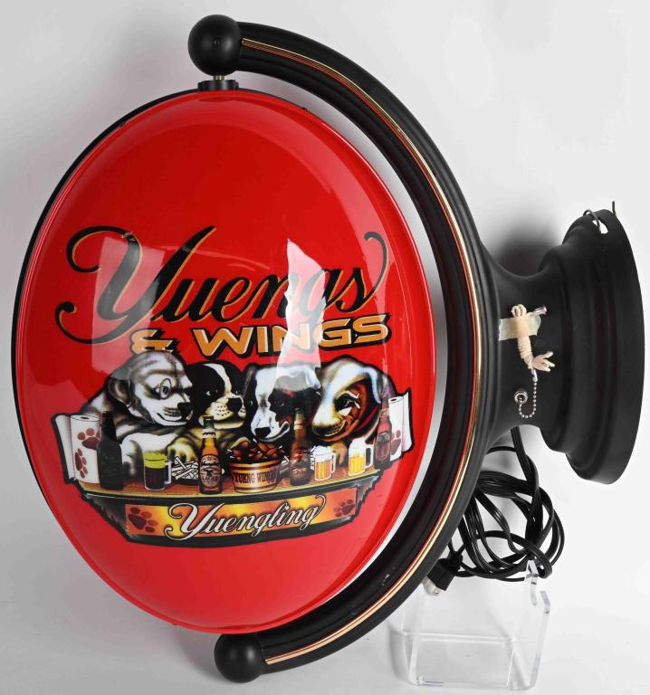 YUENGLING BEER REVOLVING LIGHT-UP SIGN: Yuengling Beer and Wings Revolving Light-Up Sign. Great image of Dogs drinking beer. Lighted up and worked when tested. 24" Excellent