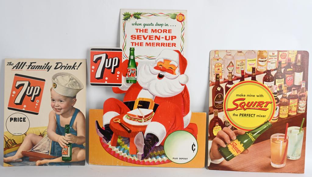 3- SODA POP CARDBOARD EASEL SIGNS: Includes 2 7up and Squirt. All with nice colors. Largest 23 1/2" Excellent
