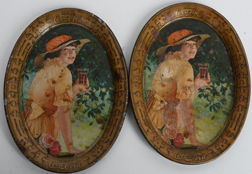 2- 1916 COCA COLA TIP TRAYS PASSAIC METAL WARE CO: Both have nice graphics with general wear and soiling. Marked The Coca Cola Co. Passaic Metalware Co. Passaic N.J. About 6" by 4 1/2"Very Good