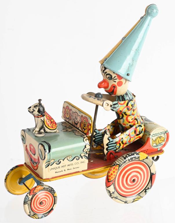 UNIQUE ART TIN WINDUP ARTIE THE CLOWN CAR: All original with nice graphics. Windup works. 9" Excellent