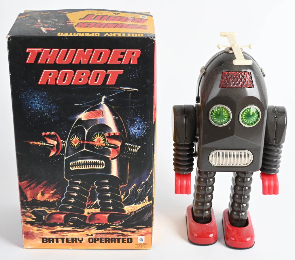HA HA TOY BATTERY OP THUNDER ROBOT w/ BOX: Reissue of the classic Thunder Robot. Made to exact specs. Boxed 12" Excellent