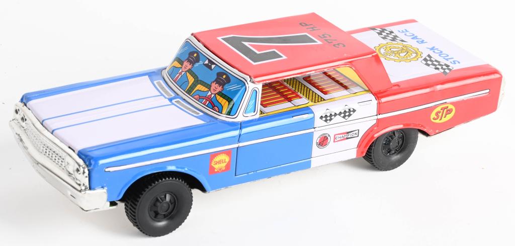 JAPAN TIN FRICTION #7 STOCK CAR: All original with Shell and STP graphics. Friction works. 11" Excellent