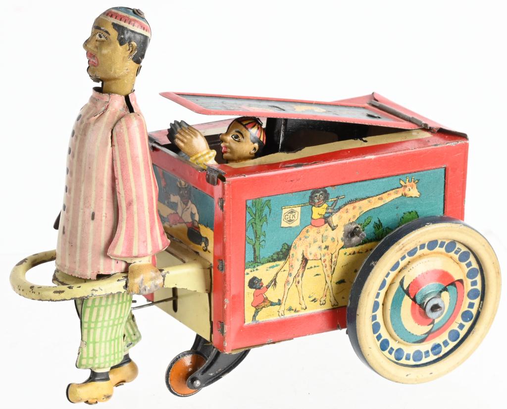 G&K TIN WINDUP MANDARIN PULLING CART: All original with great colors and graphics. Windup not working. 6 1/2" Excellent