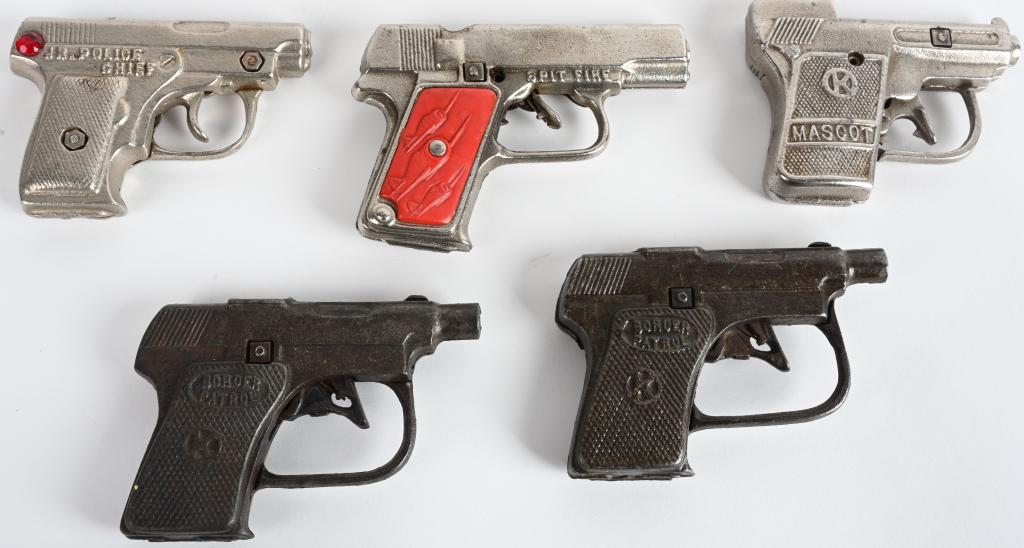 5- VINTAGE CAST IRON CAP PISTOLS: Includes 2- Boarder Patrols, Mascot, Jr Police Chief, and Spit Fire with broken grip. Largest 5" Very Good-Excellent