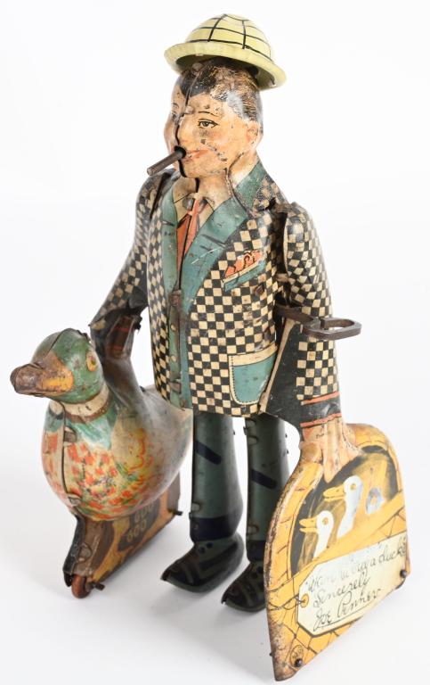 MARX TIN WINDUP JOE PENNER & DUCK: Complete toy with replaced hay. Windup works. 8" Very Good