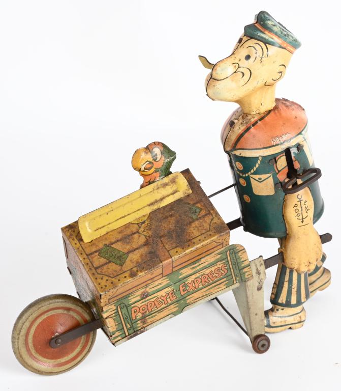 MARX TIN WINDUP POPEYE EXPRESS w/ MOVING PARROT: All original scarce version with moving parrot. Windup works. 9" Very Good