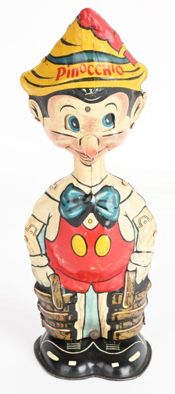 MARX TIN WINDUP PINOCCHIO WALKER: Tin windup Disney toy dated 1939. Nose replaced. Windup works. 8 1/2" Excellent