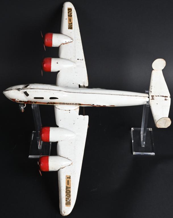 BUDDY L Pressed Steel AIR CRUISER 4 PROP AIRPLANE: Nice large all original Buddy L pressed steel Air Cruiser airplane. Original paint and decals. May clean to a higher grade. 27" wing span. Very Good-Excellent