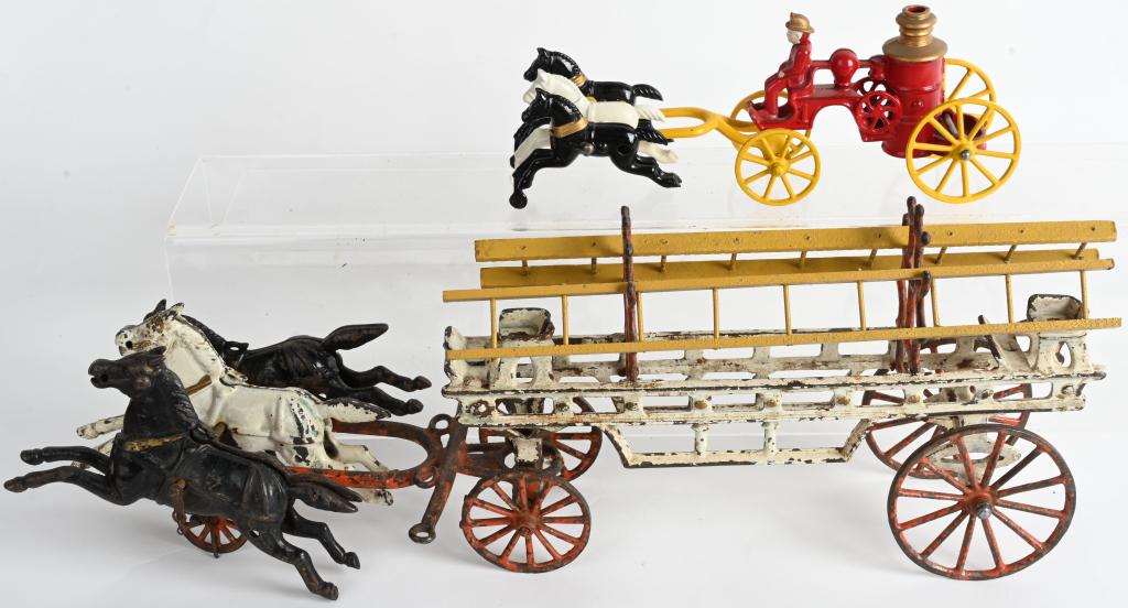 KENTON and HUBLEY CAST IRON HORSE DRAWN TOYS: Nice lot includes a 20" Hubley cast iron Ladder Wagon. The coupler on the wagon is replaced by a twisted wire and a piece is separated from the triple tree. The other toy is a Near Mint 10" Kenton cas
