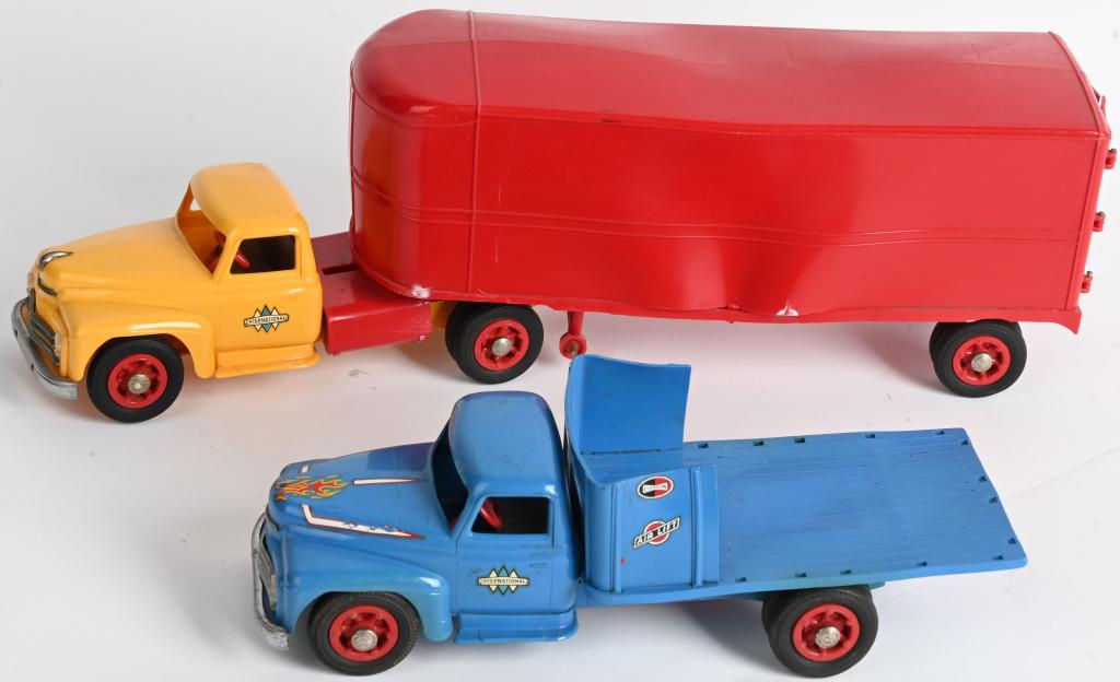 2- PRODUCT MINIATURES INTERNATIONAL PICKUP TRUCKS: Includes International Tractor Trailer with some warping and International Stale Bed Truck with some warpping, added stickers, and missing stakes. Largest 18" Very Good