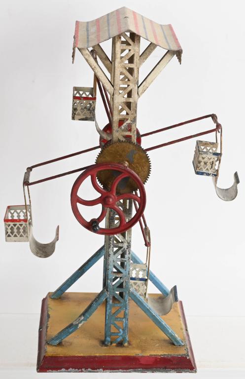 DOLL CO FERRIS WHEEL STEAM TOY: Nice German hand painted Ferris Wheel. Made as steam toy accessory or has hand crank on side. Nice colors with some wear. 10 1/2" Very Good-Excellent