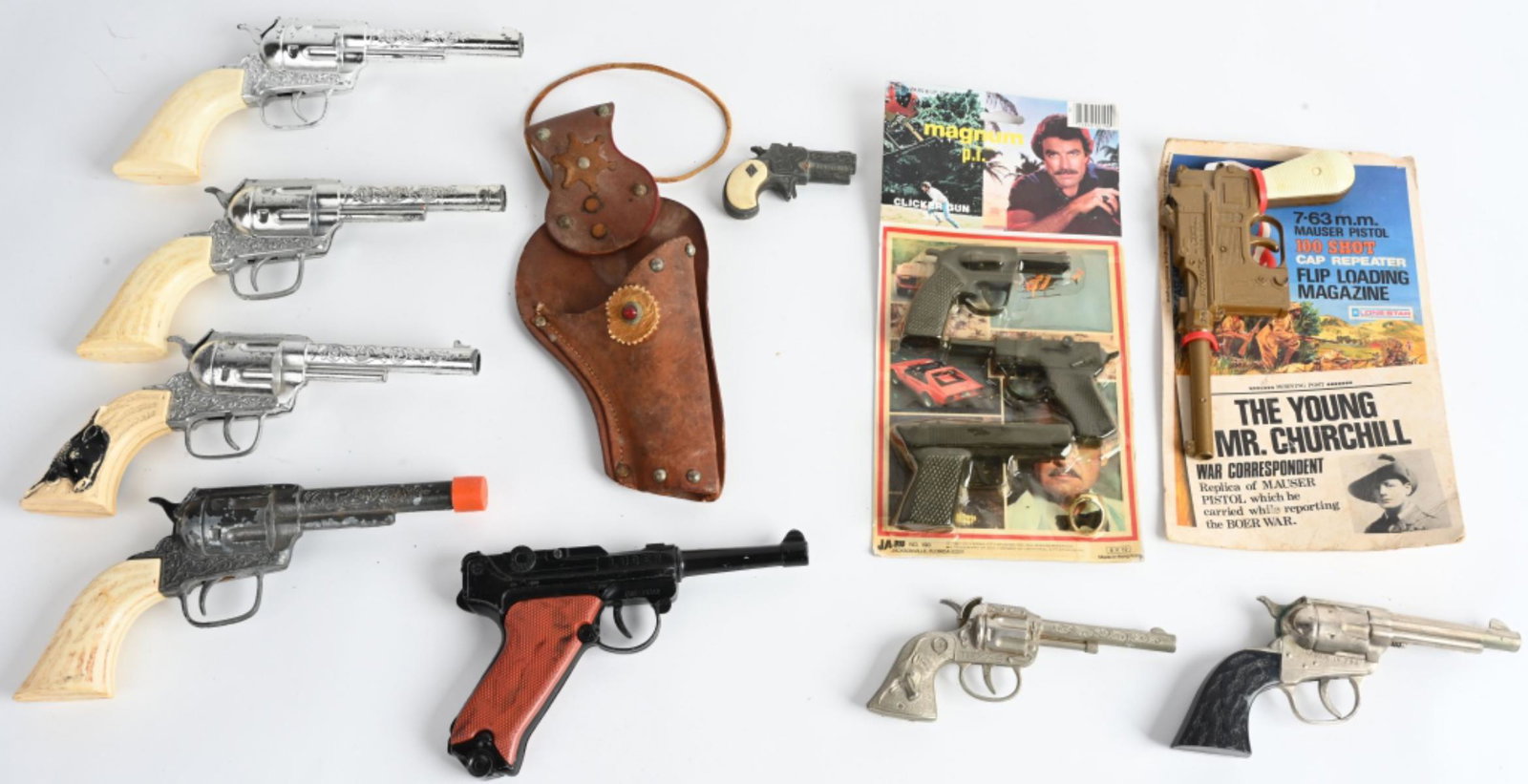 LOT OF VINTAGE CAP GUNS: Nice lot of vintage Cap Guns some with Boxes