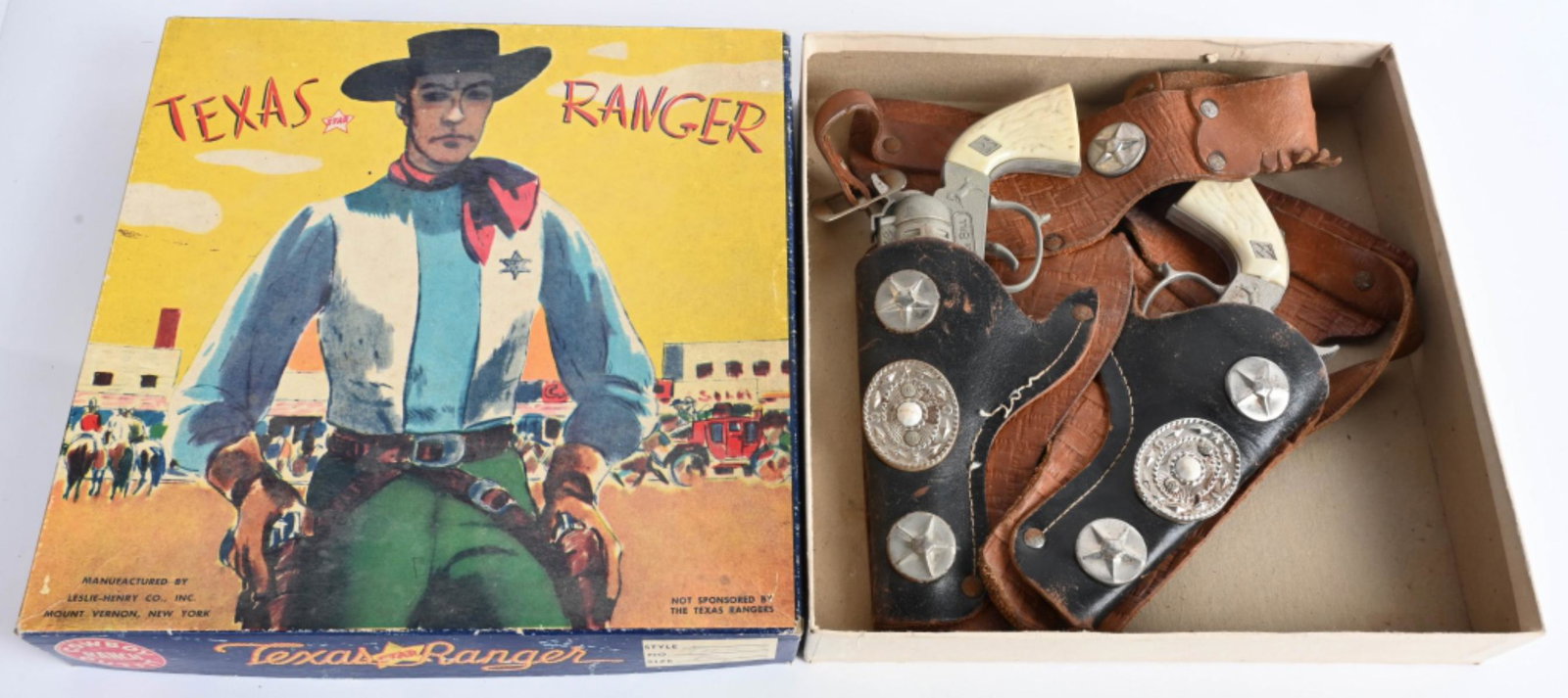 TEXAS RANGER 2 CAP GUN HOLSTER SET w/ BOX: Includes 2 Hubley Young Buffalo Bill Cap Guns and Leather Holster. All original. Boxed 10" Excellent