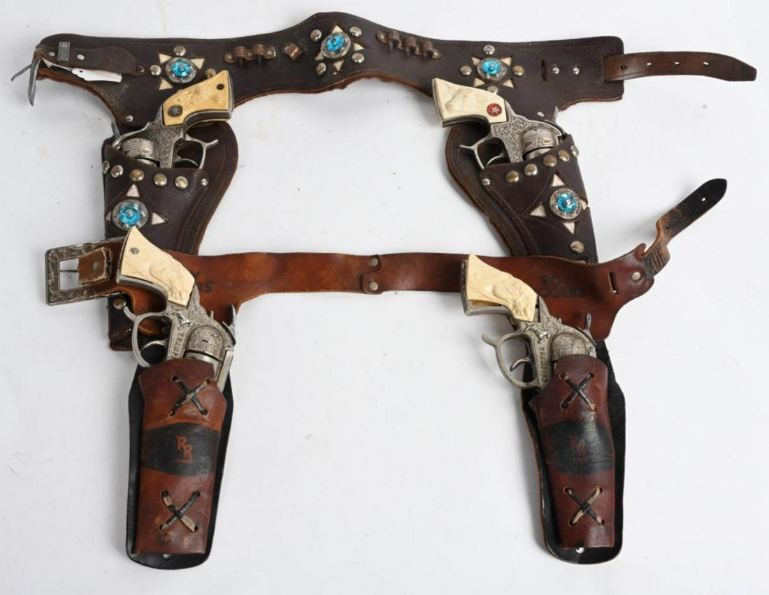 2- VINTAGE 2 CAP GUN HOLSTER SETS: Includes 2 Texan Cap Guns with Leather Holster and 2 Champion Cap Guns with Leather Holster. All original. Largest cap gun measures 10" Very Good-Excellent