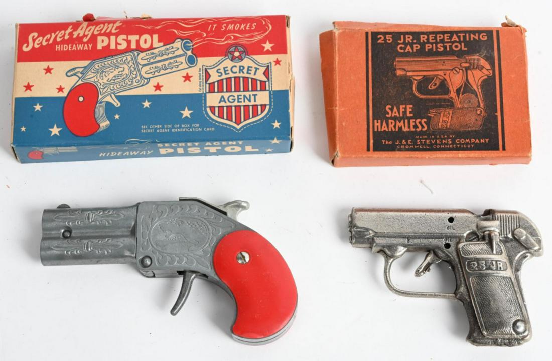 SECRET AGENT & 25 JR CAP GUNS w/ BOX: Includes Hamilton Secret Agent Cap Pistol and 25 Jr Repeating Cap Pistol. Both all original and Boxed. Largest 6" Excellent