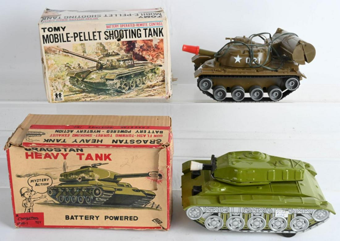 2- JAPAN BATTERY OP MILITARY TANKS: Includes Tomy Mobil-Pellet Shooting Tank and Cragstan Heavy Tank. Both look complete and boxed. Largest 9 1/2" AS-IS