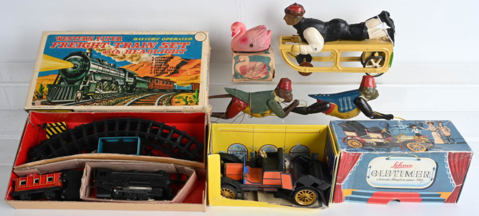 LOT OF VINTAGE TOYS: Includes Dayton Boy on Sled, Schuco Old Timer Car with Box, Western Flyer Train with Box, Climbing Monkeys, and More. AS-IS