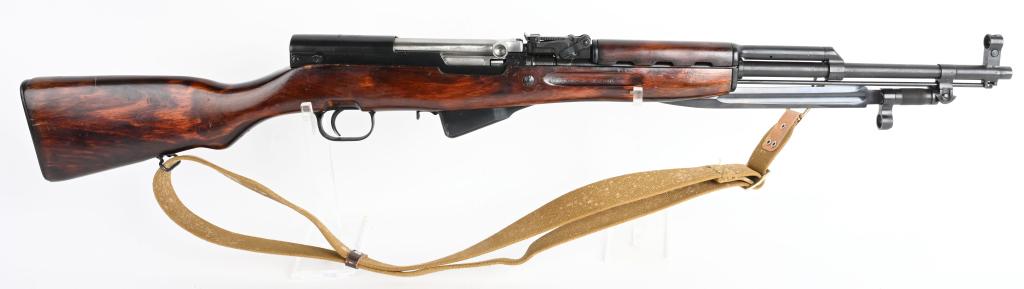 RUSSIAN MODEL 45 SKS RIFLE WITH BLADE BAYONET.: SERIAL NUMBER 3M997 / 9929963 BARREL 20" CALIBER 7.62X39 MANUFACTURED 1952. Produced in Russia with blue finished steel and Arctic Birch stocks. 10 round stripper clip fed magazine and fitted with fol