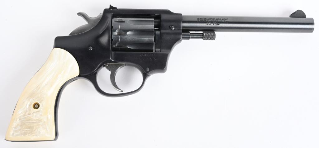 EXCELLENT HI-STANARD SENTINEL DELUXE REVOLVER: SERIAL R-107. BARREL 6". CALIBER .22 RIMFIRE. Made from 1957-74. This is the Sentinel 9-shot, double action, blue finish with wind drift rear sight and faux pearl grips in blue finish. Aside from few 