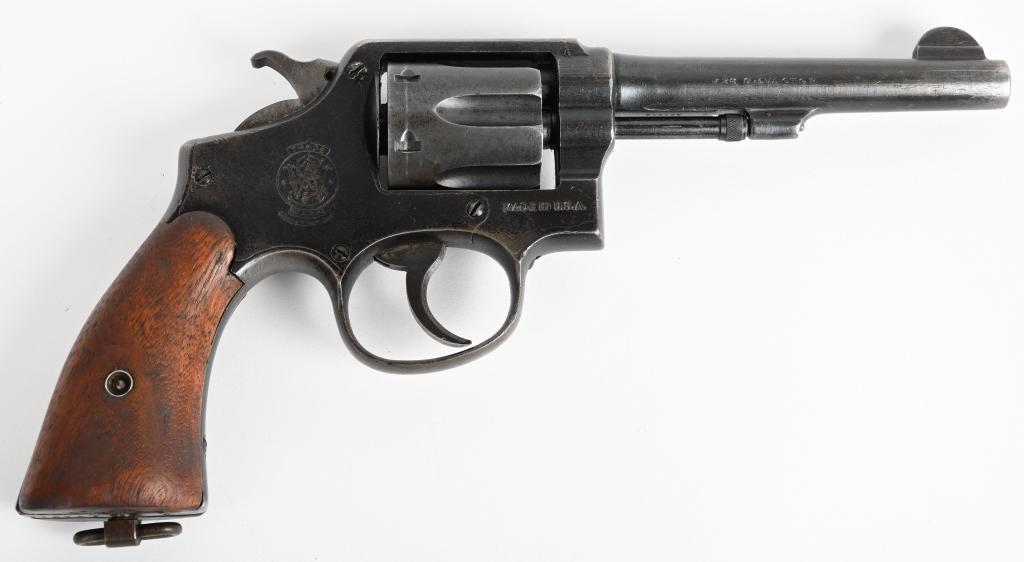 SMITH & WESSON VICTORY MODEL REVOLER: SERIAL V364512. BARREL 5". CALIBER .38 S&W. Made from 1942-45 only, the 5" barrel version is very difficult to find. Top of frame is stamped "US PROPERTY" with flaming bomb and GHD Guy Dewey inspector