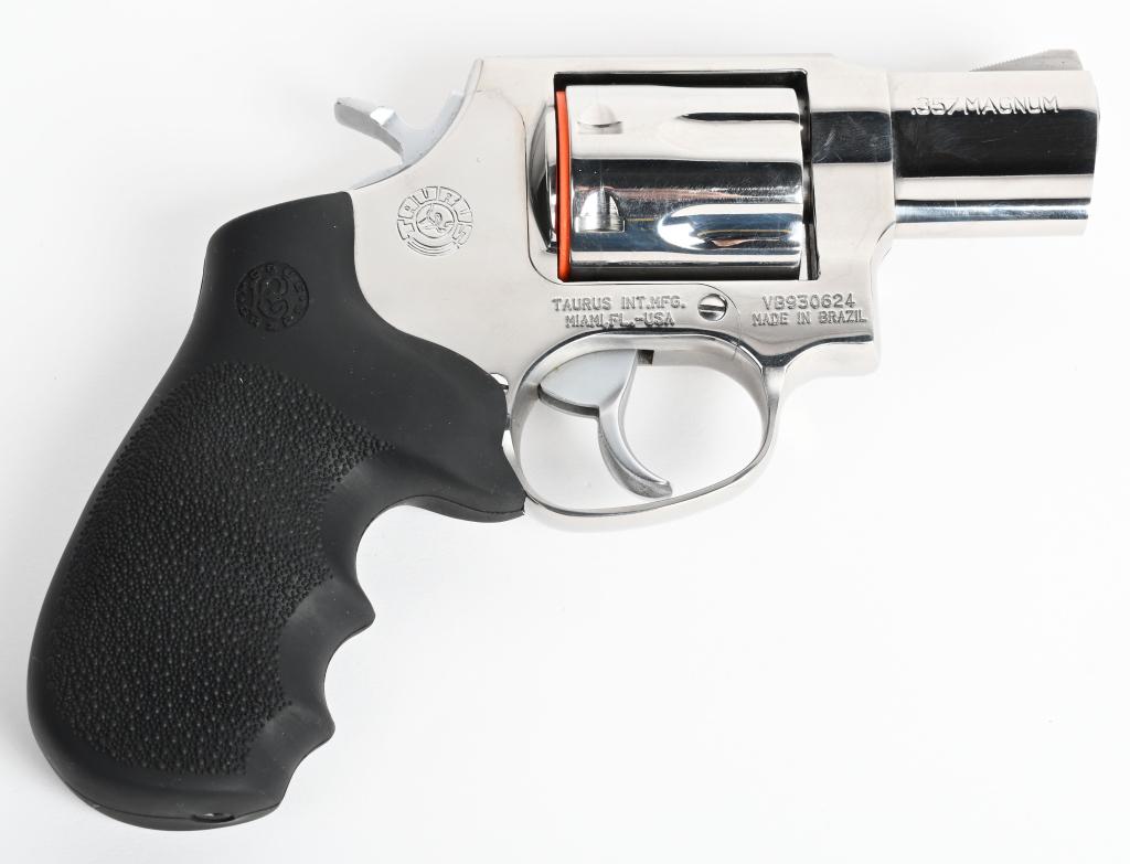 TAURUS MODEL M617 7-SHOT REVOLVER: SERIAL VB930624. BARREL 2". CALIBER .357 MAGNUM. A pocket powerhouse that holds that one extra round. Features factory high polish stainless steel , 7-shot, double action, fixed sights and Hogue rubbe