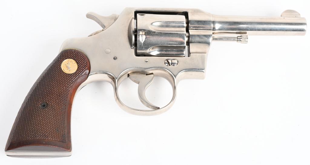 PRE-WAR COLT NICKEL OFFICIAL POLICE REVOLVER: SERIAL 547304. BARREL 4". CALIBER .38 SPECIAL. MADE IN 1929. Standard arm of the law in the roaring twenties, carried in the side pocket of just about every beat cop in the country. This gun retains v