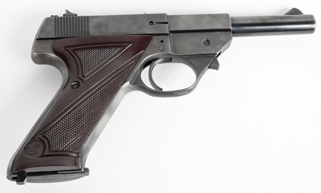 HIGH STANDARD SPORT KING SEMI AUTO PISTOL: SERIAL 399784. BARREL 4 3/8". CALIBER .22 LONG RIFLE. MADE IN 1951. Features wind drift rear sight, fixed front, blue finish, front latch barrel release, checkered brown plastic grips in blue finish. 