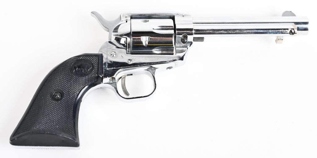 UNFIRED GERMAN SA MODEL 21 HS .22 REVOLVER: SERIAL 413060. BARREL 4 3/4". CALIBER .22LR. This gun is a copy of the small Colt Frontier. 22 caliber single action revolvers. It is chrome plated with monogram black checkered grips, fixed sights, s