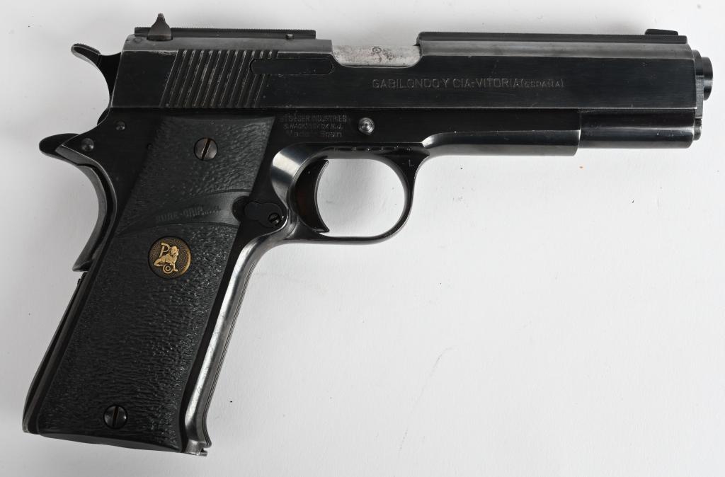 EARLY LLAMA .45 SEMI AUTO PISTOL: SERIAL B86324. BARREL 5". CALIBER .45 ACP. Built in Spain using the classic Colt 1911 platform comes this well made clone with the early solid matted rib that really gives this gun a great look. It al