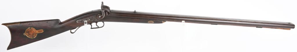 ANTIQUE DROP LOCK COMBO GUN: Features a .40 bore rifled and 28 bore smooth, percussion, back locks marked Golcher, walnut half stock, left side cheek piece, right side patch box, brass furniture, rifle sights. Metal is brown pati
