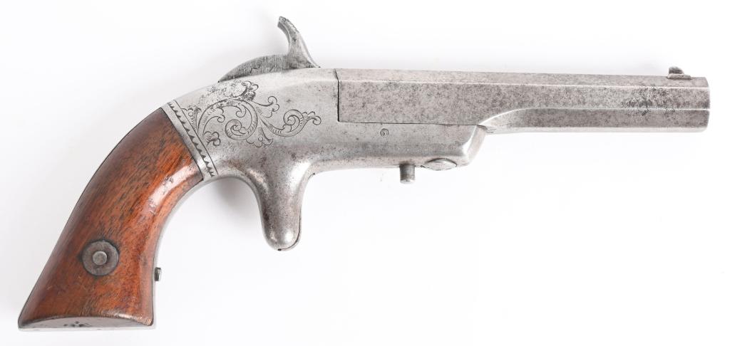 BACON MFG. CO. SINGLE SHOT PISTOL: SERIAL 193. BARREL 3 3/4". CALIBER .32 RIMFIRE. Flush fitted recoil shield small frame. Made mid 1860's Frame lightly factory engraved About 800 made of this style. Features octagon barrel, spur trigg