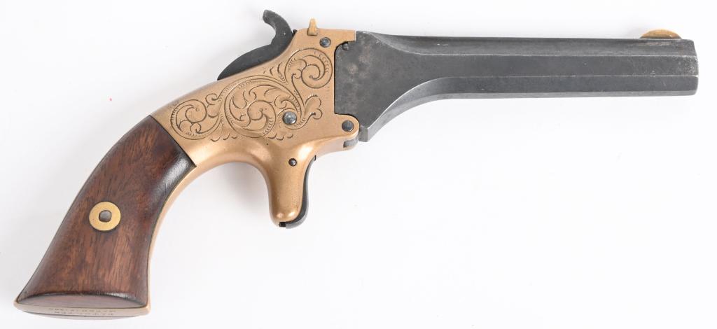 RARE T.J. STAFFORD SINGLE SHOT PISTOL: SERIAL NSN. BARREL 3.5". CALIBER .22 RIMFIRE. MADE EARLY 1860'S Mfg. in New Haven with total quantity about 2100 pistols. Features full octagon barrel, single shot, factory engraved brass frame, spur 