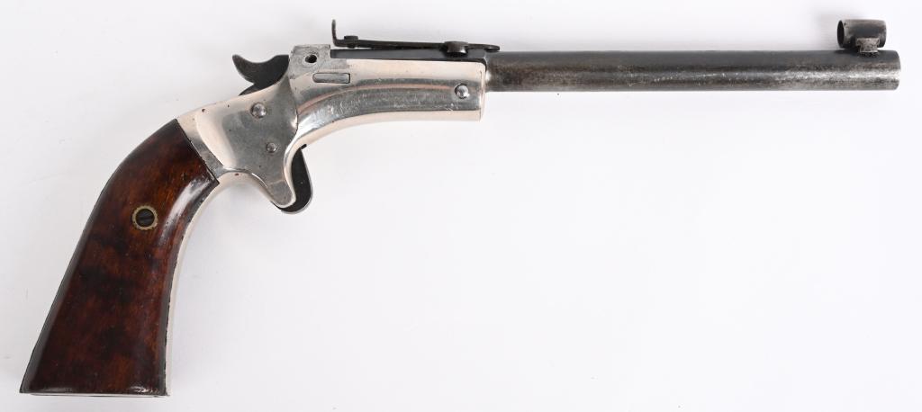 EARLY STEVENS 6" POCKET RIFLE- 1ST TARGET PISTOL: SERIAL 38449. BARREL 6". CALIBER .22 SHORT. MADE 1869-1886. First Stevens target pistol and not cut for shoulder stock. Features blue part octagon barrel, factory nickel frame, spur trigger, top break