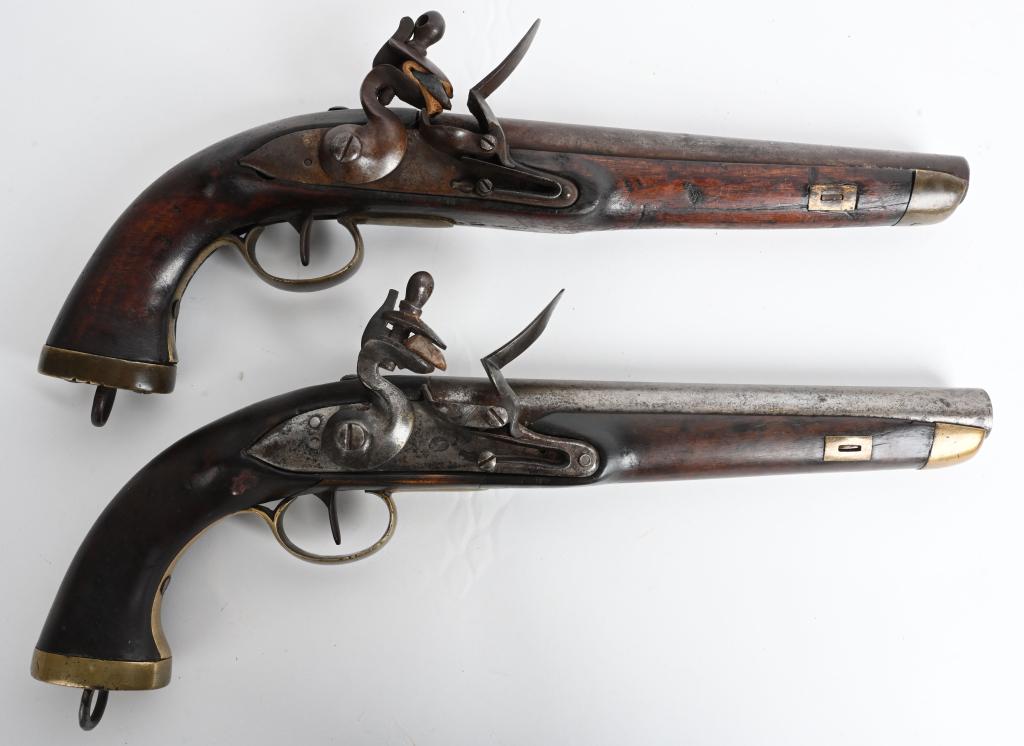 PAIR OF BELGIUM FLINTLOCK BELT PISTOLS: No visible maker mark or cartouche, most likely Belgium. Matched set but one hammer a bit different and was probably period replaced. Both guns feature 9" barrels in .69 bore, flintlock action, brass 