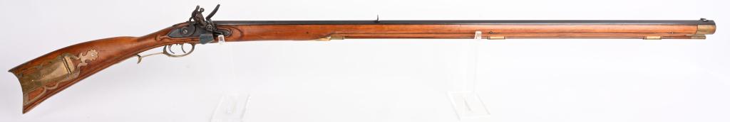 QUALITY CUSTOM FULL STOCK FLINTLOCK KY. RIFLE: BARREL 42". CALIBER .45. Beautiful carved and incised Birch stock , brass furniture, signed lock, double set triggers, brass patch box, blued barrel. Top notch workmanship. Excellent condition. Fine B